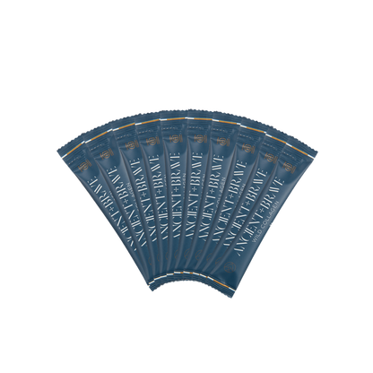 Multiple blue sachets of 'Ancient + Brave's Wild Collagen' on a white background