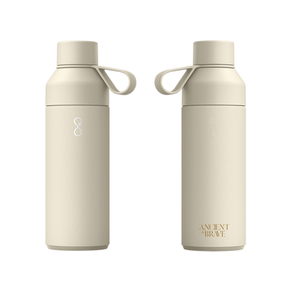 Two beige water bottles with handles on a white background, featuring the brand 'Ancient + Brave'.