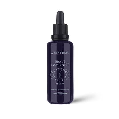 Purple bottle labeled 'Brave Immunity' on a white background