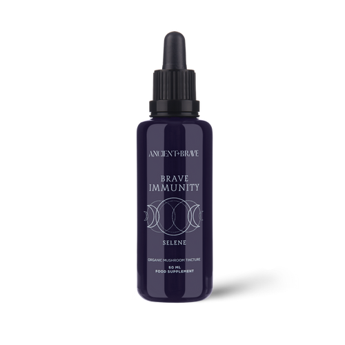 Purple bottle labeled 'Brave Immunity' on a white background