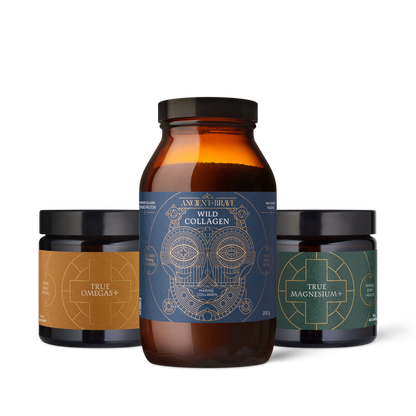 Three supplement jars with labels on a white background