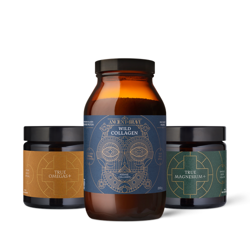 Three supplement jars with labels on a white background