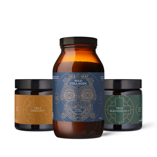 Three supplement jars with labels on a white background