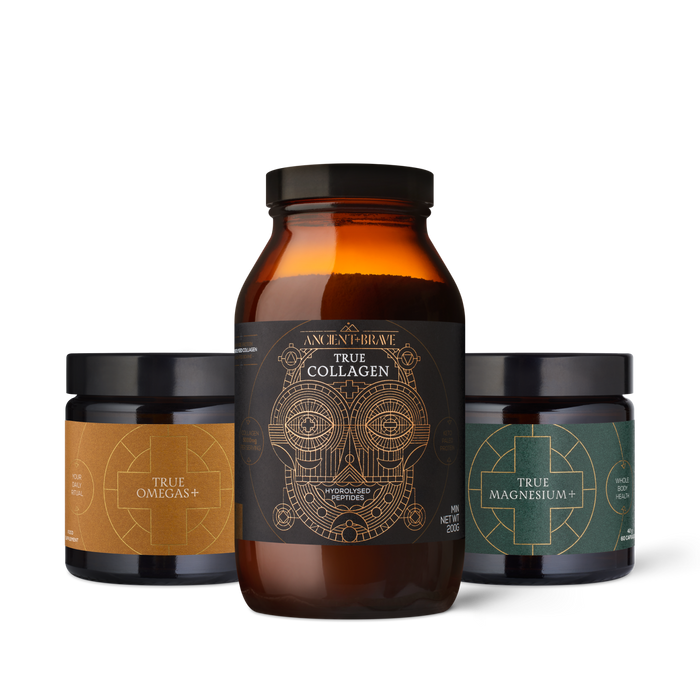 Three supplement jars with labels on a white background