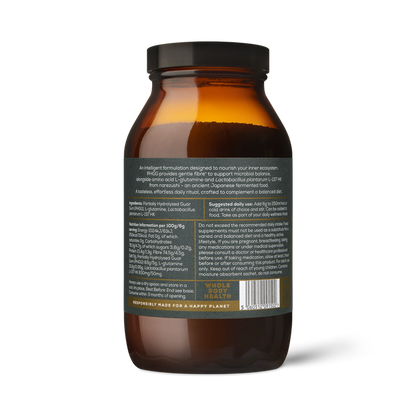 A brown glass jar of Ancient + Brave True Biome features a gray label with white text listing supplement facts, ingredients, and dosage instructions. The jar contains a gut barrier support powder and is displayed against a white background.