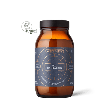 A brown bottle labeled 'True Hydration' by Ancient + Brave with text describing the product as an advanced electrolyte formula.